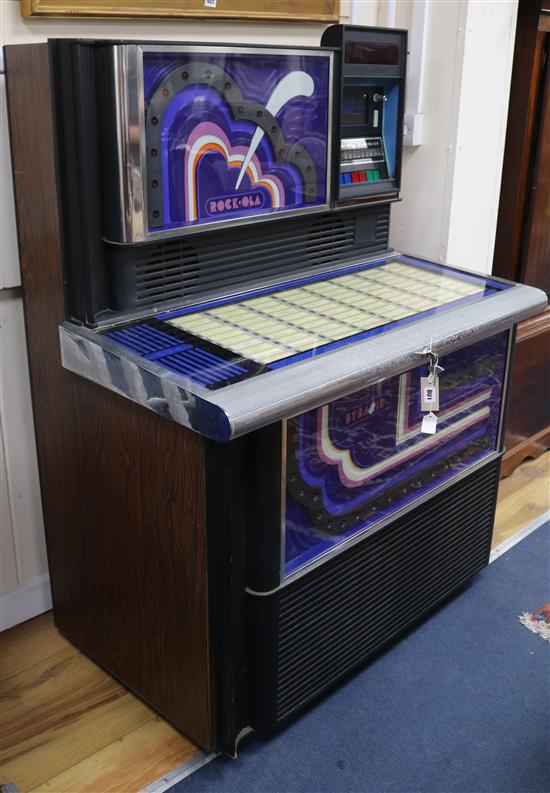 A 1978 Rock-ola Juke box, W.104cm